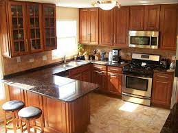 Tan brown granite brings out the best of any space. Tan Brown Granite Countertops Pictures Cost Pros And Cons