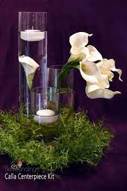 This Lovely Centerpiece Uses Alexia Cylinder Set With The Tallest Vase Standing At 16 A C Floating Candle Centerpieces Candle Centerpieces Floating Candles
