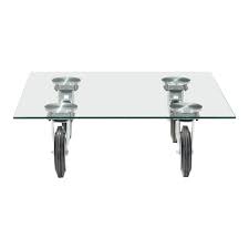 Brass hub in centre making it beautiful. Zuo Modern Belle Coffee Table With Wheels 40 2 In X 40 2 In Clear Glass 100755 Rona