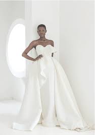 These delicate pieces seem to glide over the skirt and move with each step you take. 10 Black Wedding Dress Designers To Wear On The Big Day Ijeoma Kola