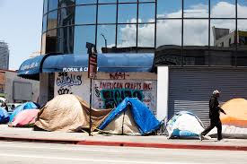 Skid row is a sprawling tent city in the heart of downtown los angeles where you'll find thousands of people sleeping on the streets, diseases, no toilets. Facing La S Human Catastrophe On Skid Row With Faith Angelus News