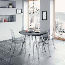 L'acier brossé sera parfait pour une salle à manger industrielle ou moderne la chaise design en plexiglas conviendra aux décorations originales Mobilier Deco