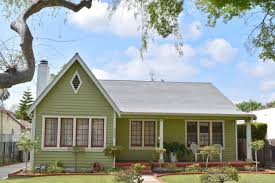 Olive green lightens to moss green window sashes which are highlighted by off white trim. Olive Green Exterior Ideas Photos Houzz