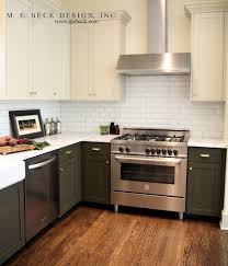 Kitchen With Dark Grey Cabinets Painted Benjamin Moore Raccoon Fur Accented With Antiqued Mirrore Upper Kitchen Cabinets Best Kitchen Cabinets Kitchen Cabinets