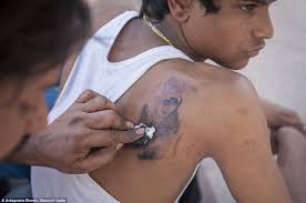 Great news!!!you're in the right place for india love tattoo. India S Young Men Risking Lives With Roadside Tattoos Daily Mail Online