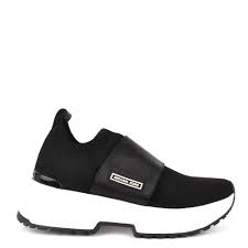 A soft knit and sporty wedge heel blend with contemporary styling making the cosmo sneakers from michael michael kors an easy pick for casual looks. Michael Michael Kors Cosmo Knit Black Slip On Trainer