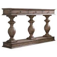 Founded atop a turned pedestal base, this piece is crafted from solid rubberwood and manufactured wood with cherry veneers in a neutral black finish that's versatile enough to complement most color palettes. Sofa Console Tables Ic Tasarim Mobilya Aynalar