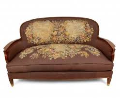 Two sofas, beech, fabric, europe, 1940s these sofas has a strong appearance, due the high back and the round armrests that are emphasized by the wooden. Tan Leather Camelback Settee