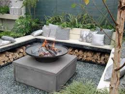These simple benches are made from wide wooden boards with more of the white brick for support. Diy Outdoor Seating Area With Fire Pit Off 71