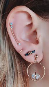 Lower Back Tattoos For Females In 2020 Multiple Ear Piercing Cute Ear Piercings