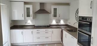 Grey laminate worktops are an incredibly popular for contemporary and modern kitchens alike. Modern Inframe Shaker White Grey Symphony Kitchen Used Kitchen Hub