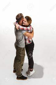 These hugs go longer than normal hugs and full of feelings and emotions that can be expressed with words. Full Body Portrait Of Hugging Couple Caucasian Models In Love Stock Photo Picture And Royalty Free Image Image 110015010