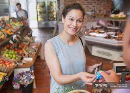 Sam's clubs* *if you're not a sam's club member, you may shop at a sam's club store, but a 10% service fee will apply. Woman Paying With Credit Card At Grocery Store Checkout Incidental People Food And Drink Stock Photo 200686496