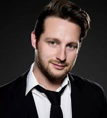 Meet the polyamorous Brit who lives with two women in the US, raising their  children as 'a throuple'