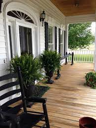 I will list 21 simple and cheap diy floating deck ideas so that you can make one yourself for your garden. Black And White Porch Front Porch Decorating Front Porch Design Farmhouse Front Porches