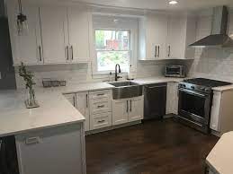 Stainless Steel Appliances And Farm Sink Oil Rubbed Bronze Hardware And Lighting Kitchen Remodel Kitchen Hardware Kitchen Renovation