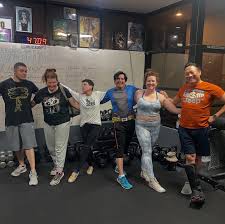 Sometimes all you need to get through the day to day, rage-inducing news  cycle is a friendly group of faces and the desire to collectively move  thousands of pounds of iron! Have