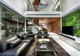 To get furniture up a spiral staircase, you use the railing. Stunning Modern Home In Singapore With A Spiral Staircase That Wows