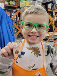 Today's episode of Building with Daniel and Luke takes us to the  Strongsville Home Depot where we made Cocoa Frame picture ornaments.
