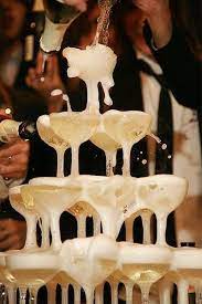 Pin By Cavavin Vernon On Drinks Champagne Tower Champagne Fountain Gatsby Wedding