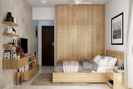 Wood, as a material, gives you the option of self design and you can choose between different patterns and grains to amp up the look of a simple wooden cupboard. Small Bedroom Cupboard Design Novocom Top