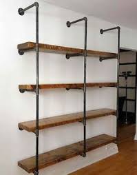 Étagère de style industriel avec structure en acier et rayons en bois. Etageres Rustique Industriel Rustic Industrial Shelving Units Etagere Style Industriel Etagere Rustique Deco Salon Industriel