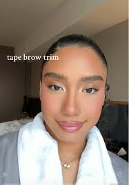 How to Tame Long Curly Eyebrows