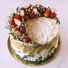 Flowers and strawberries on cake. Rustic Gold Strawberries And Herbs Cake