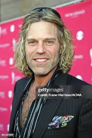 Singer Andy Griggs and wife Renee Griggs arrive at the 43rd annual... News  Photo