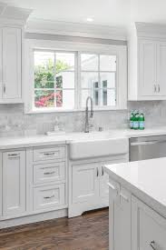 Large Elegant Galley Dark Wood Floor Eat In Kitchen In Long Beach Ca With White Cabinets Grey Marble Ba Dark Wood Floors Marble Kitchen Island Kitchen Marble