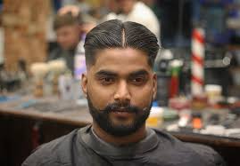 The parted middle line remains straight throughout the length of the top of the head). 19 Medium Hairstyles For Men Cool 2020 Styles