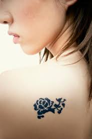 The rarity and supernatural air of the unnatural black rose, which is only available after dyeing by florist. Rose Tattoo Designs Meanings