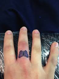 Butterfly Finger Tattoo Number Two Tattoos Finger Tattoo Designs Butterfly Tattoo On Shoulder
