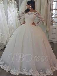 Photoed in champagne (champagne lining with ivory lace and tulle), can also be made in another color such as all ivory or white. Appliques Ball Gown Wedding Dress With Long Sleeve Long Sleeve Wedding Dress Lace Long Sleeve Ball Gown Wedding Dress Long Train Wedding Dress