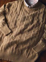 Our aren sweater is knitted from italian bouclé yarn, the yarn used is made from a thick cashmere and silk blend. Camelhair Cable Knit Crewneck Sweater The Ben Silver Collection