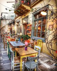 La Imagen Puede Contener Personas Sentadas Tabla E Interior Fachadas De Lojas Decoracao De Restaurante Decoracao Cafeteria