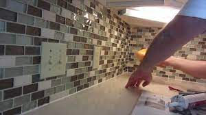 There is no glue involved in installing this backsplash because it will show right through the frosted glass! How To Install Glass Mosaic Tile Backsplash Part 3 Grouting The Tile Youtube