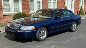 Image result for Light Ice Blue 2008 Town Car