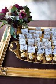For this event, ashley gain weddings put a card box on a wooden table. 16 Gorgeous And Unusual Place Card Ideas Card Table Wedding Wedding Gift Favors Wedding Table Plan