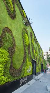 Make Your Garden Organic With These Top Tips Useful Garden Ideas And Tips Vertical Garden Green Facade Landscape Design