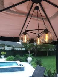 Outdoor garden chandelier bulb filled with 15 x warm white led fairy lights battery operated; Wilson Fisher Edison Bulb Trio Battery Operated Chandelier With Remote Big Lots