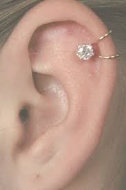 This Ear Cuff Fits Without Piercing The Upper Cartilage And Simulates A Spring Cartilage Pierc Ear Piercing Studs Unique Ear Piercings Upper Ear Piercing