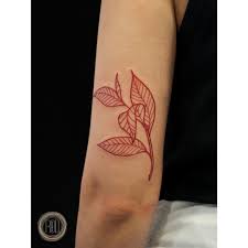 Red Leaves Inked On The Back Of The Left Arm Red Ink Tattoos Tattoos Red Tattoos