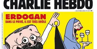 The headline of this week's cover translates into: Une Caricature D Erdogan En Une De Charlie Hebdo Scandalise La Turquie