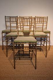 Patio furniture cushions and outdoor pillows are double duty furniture accessories that soften your metal and iron patio dining sets while adding a splash of color and style. Wonderful Pair 1940s Faux Bamboo Gilded Metal Chairs Spanish Antiques