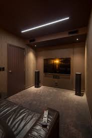 75 Beautiful Modern Home Theater Pictures Ideas February 2021 Houzz Wooden armchairs with tweed upholstery, a hardwood table with hairpin metal legs.