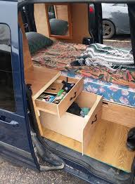 Sophie paid £900 for the knackered work van, £450 to make it roadworthy and £1,000 to complete the inside conversion. 2015 Ford Transit Connect Affordable Camper Van Conversion