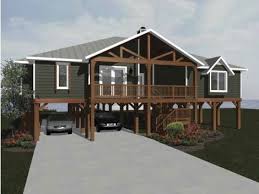 The stilt base protects the home. Fourplans Designs With Elevated Foundations Builder Magazine