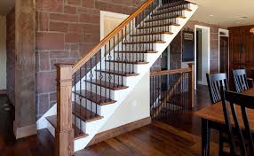 Wood and wrought iron balustrades allow you to have the warmth and comfort of wood and the versatility of wrought iron balusters. Interior Designs That Revive The Wrought Iron Railings Wrought Iron Stair Railing Wrought Iron Stairs Interior Stair Railing