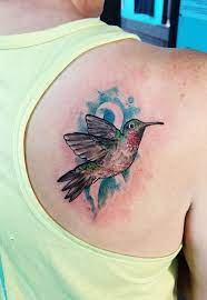 Hummingbird And Ribbon Tattoo Tattoos Leaf Tattoos Maple Leaf Tattoo